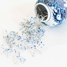 Load image into Gallery viewer, Marbled Blue and White Bow Earrings
